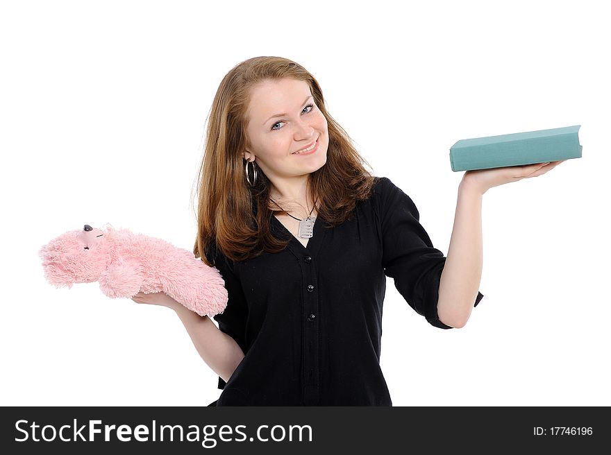 Girl with book and teddy bear , reflects,on a white background