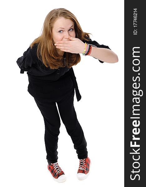 Teenage girl with hand over mouth on a white background