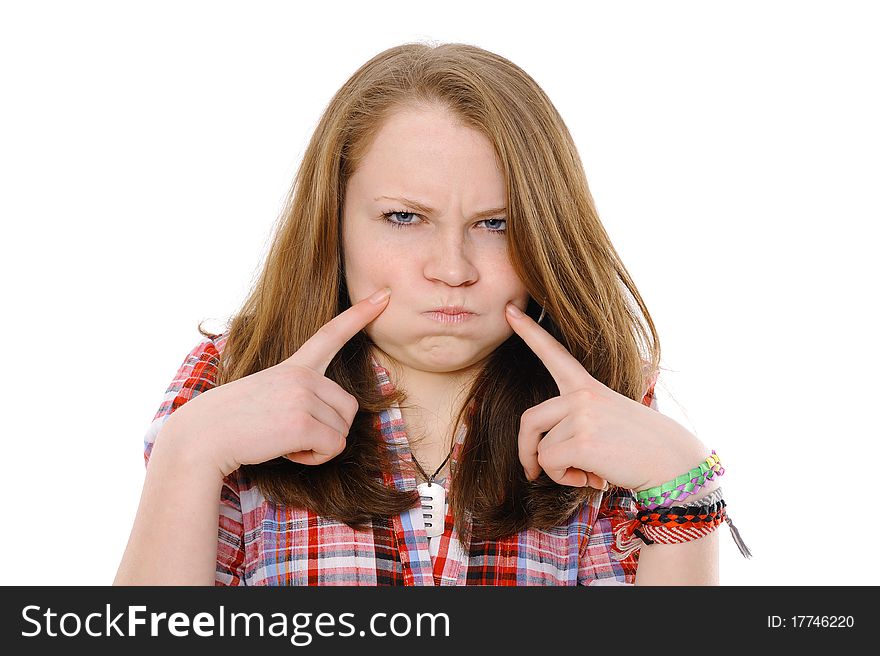 Ridiculous girl inflates cheeks on the isolated background