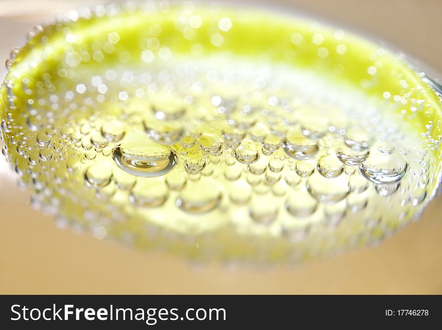 Lemon and drops of carbonated water