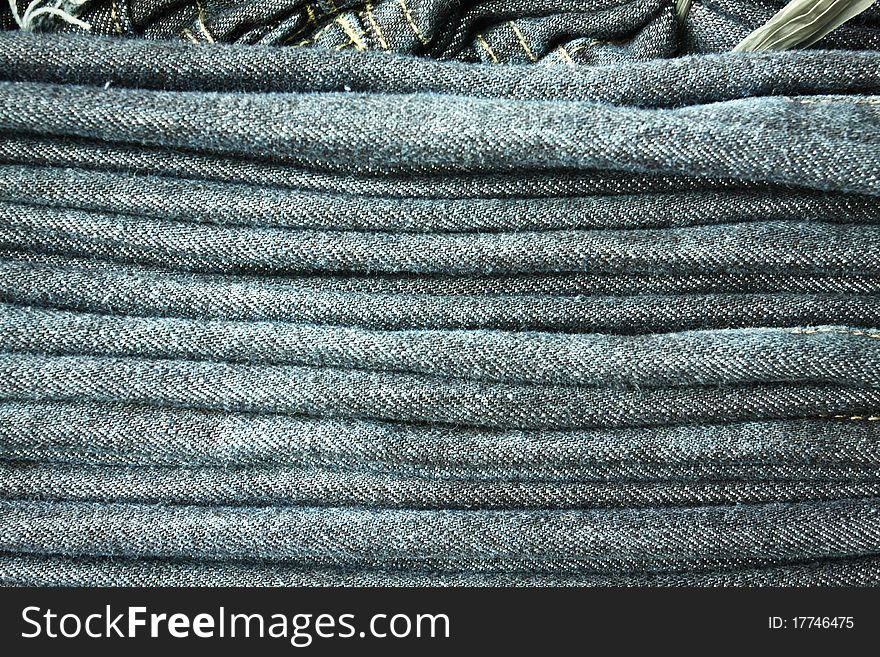 Blue jeans with texture folded and layer together. . Blue jeans with texture folded and layer together.