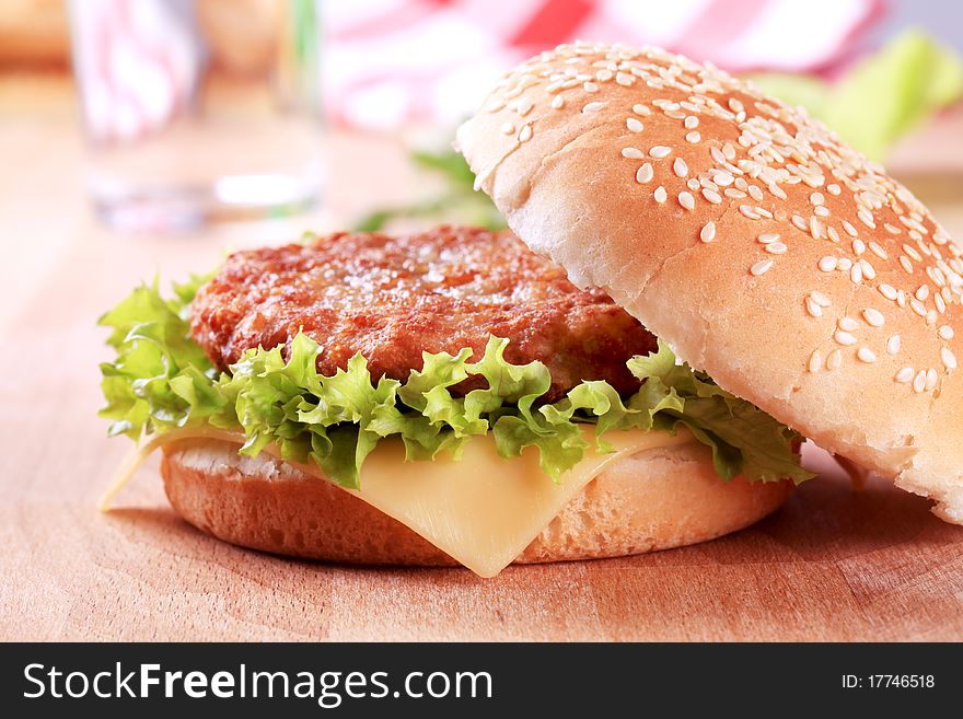 Closeup of a Cheeseburger - ready to eat