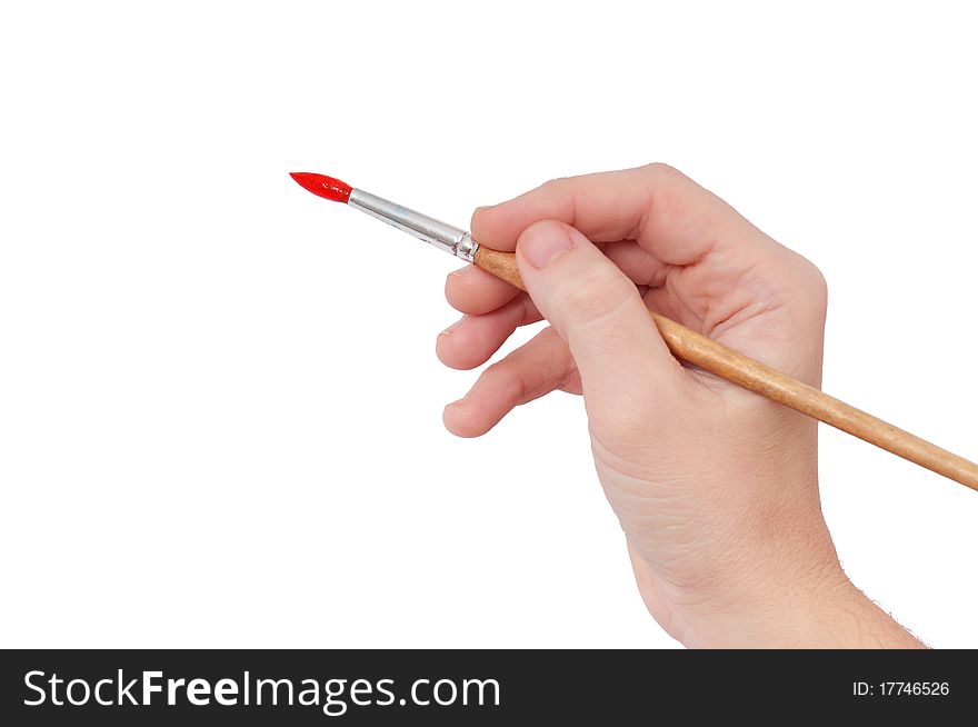 Hand with paintbrush