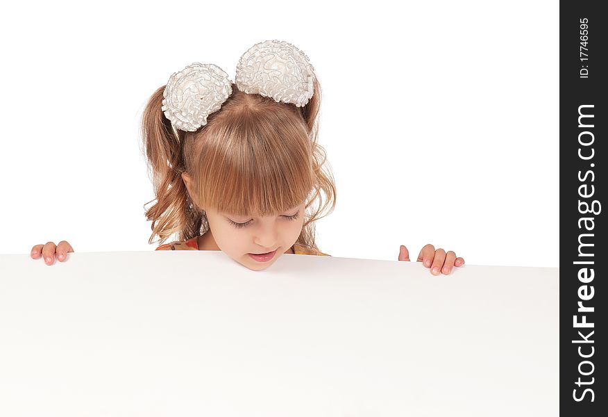 Smiling little girl holding empty white board. Smiling little girl holding empty white board