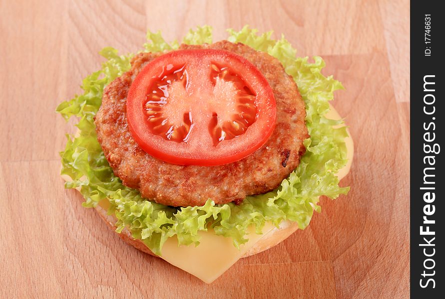 Closeup of a Cheeseburger - ready to eat