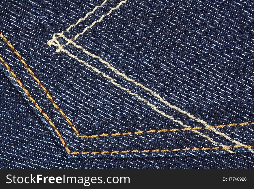 Showing lines and texture of blue jeans, back pocket. Showing lines and texture of blue jeans, back pocket.