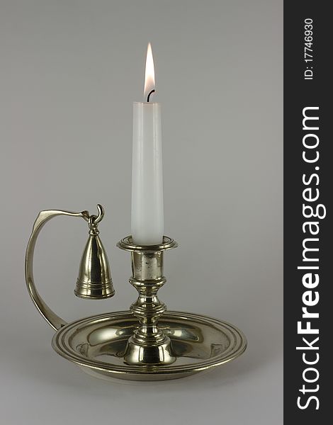 Candlestick With Burning Candle