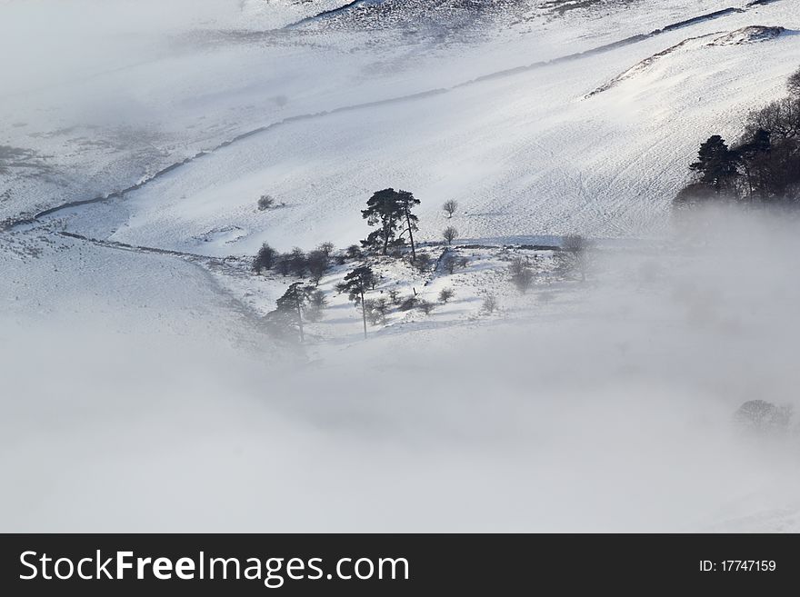 Scottish moorland landscape in snow, sun and mist. Scottish moorland landscape in snow, sun and mist