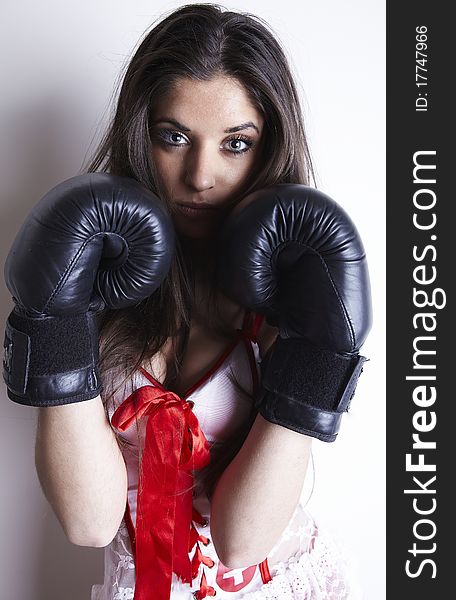 Boxing woman in sexy dress