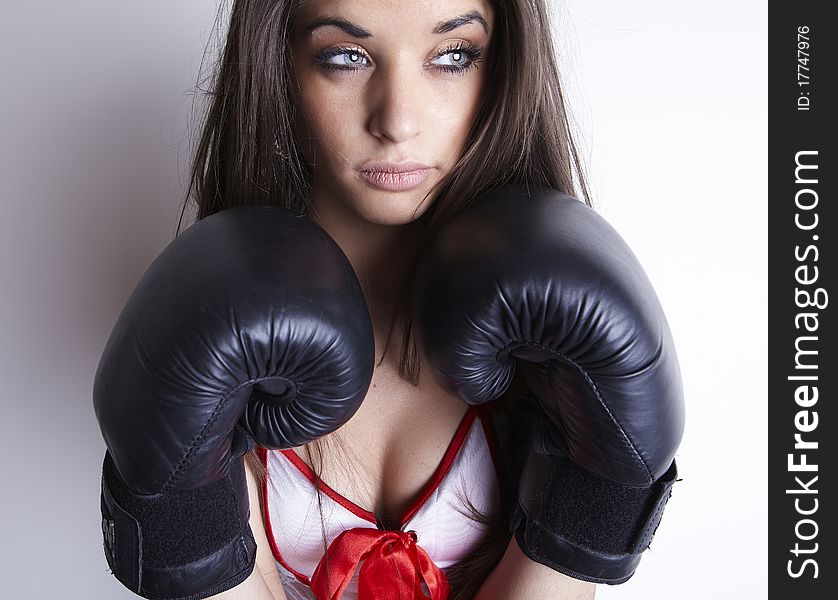 Boxing woman in sexy dress