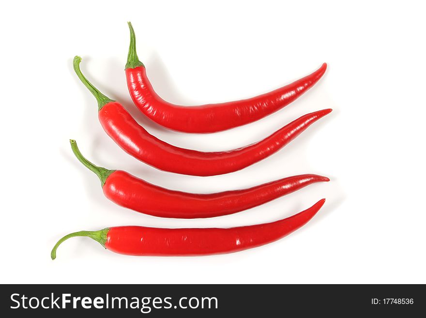 Red, fresh cayenne peppers. Vegetables isolated on white.