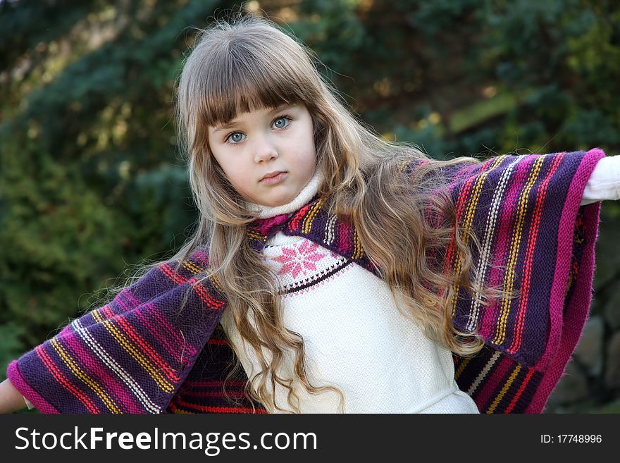 Beautiful little portrait of girl in park