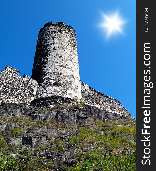 Castle tower with stone wall in sunny weather. Beautiful old castle Bezdez in Czech republic, Europe.