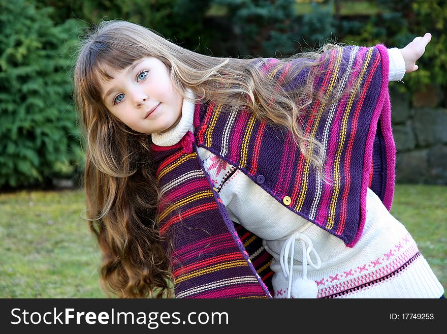 Beautiful little portrait of girl in park