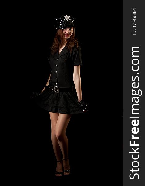 Police woman on black background