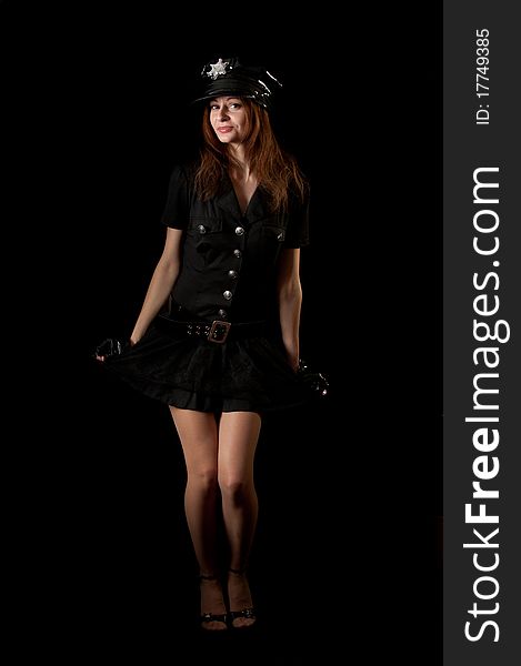 Police woman on black background