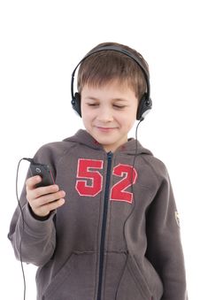 The Boy Listens To Music Stock Photography The Boy Listens To Music Stock Photography