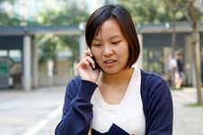 Chinese Girl Who Is Talking In Phone Royalty Free Stock Photo Chinese Girl Who Is Talking In Phone Royalty Free Stock Photo