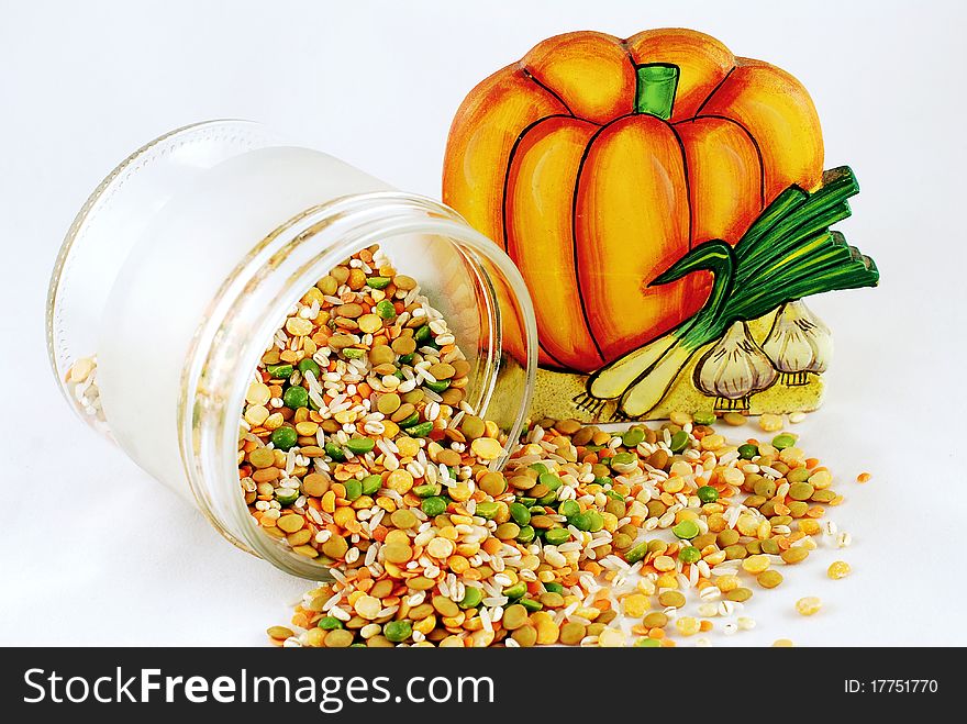 A pot with grain on white background