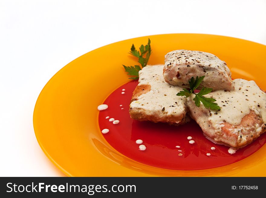 Grilled salmon with cream sauce and parsley