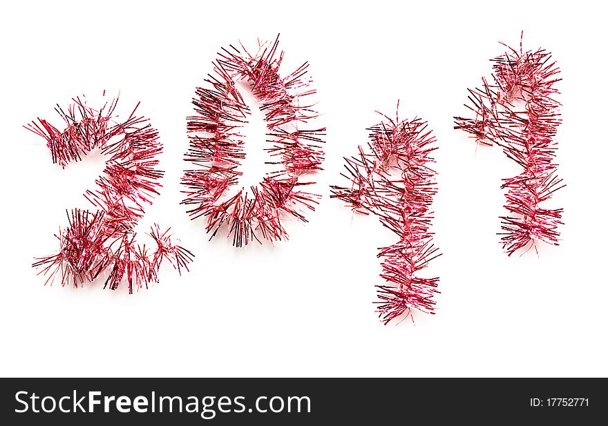 Red tinsel forming year 2011 against white background. Red tinsel forming year 2011 against white background.