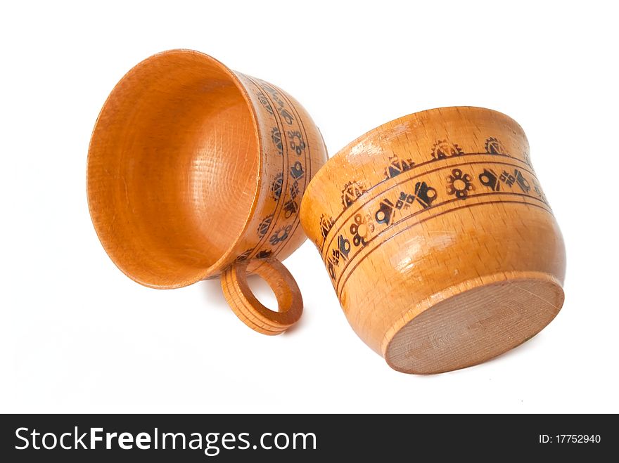 Two wooden cups isolated on white background. Two wooden cups isolated on white background