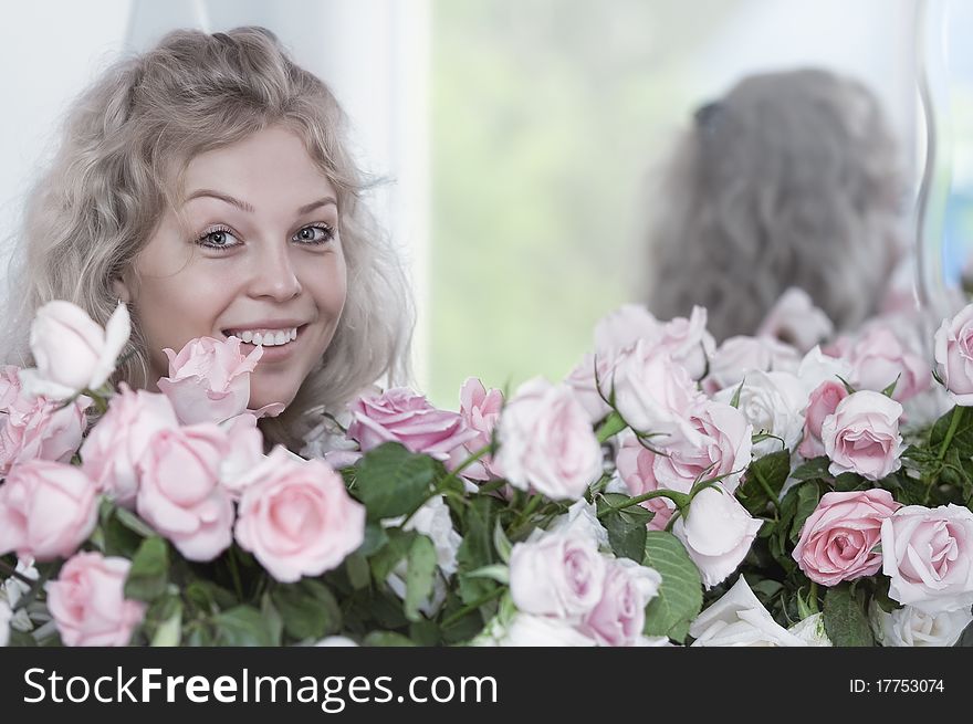 Portrait of young pretty woman with beautiful flowers. Portrait of young pretty woman with beautiful flowers