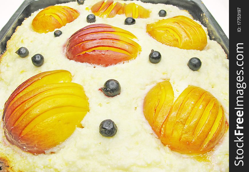 Sweet curd pudding cake with peaches fruit