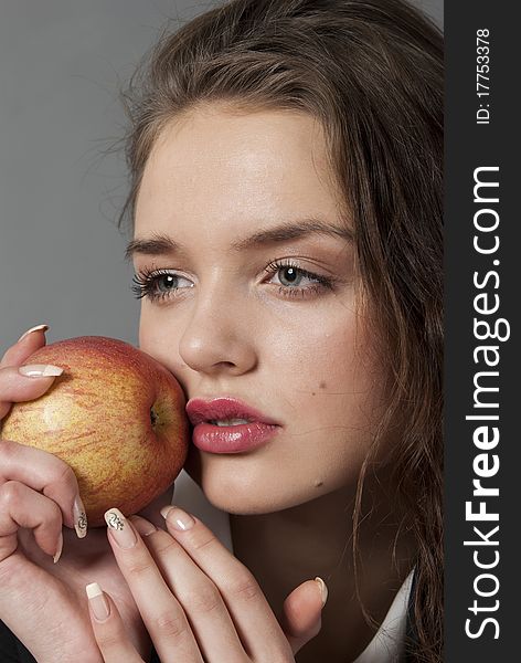 Young Woman Holding Apple