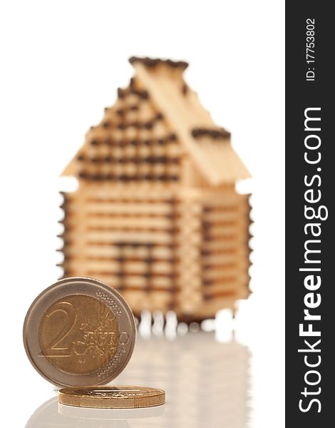 Two Euro coin with a house on white isolated background