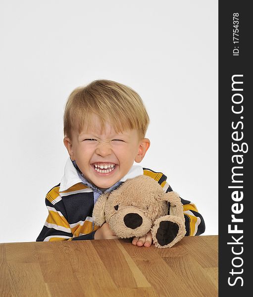 Smiling Boy With Teddy Bear