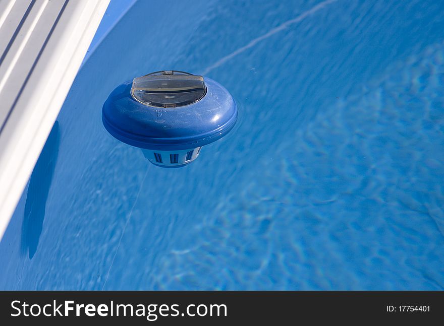 Closeup of the chlorine distributor in the pool.