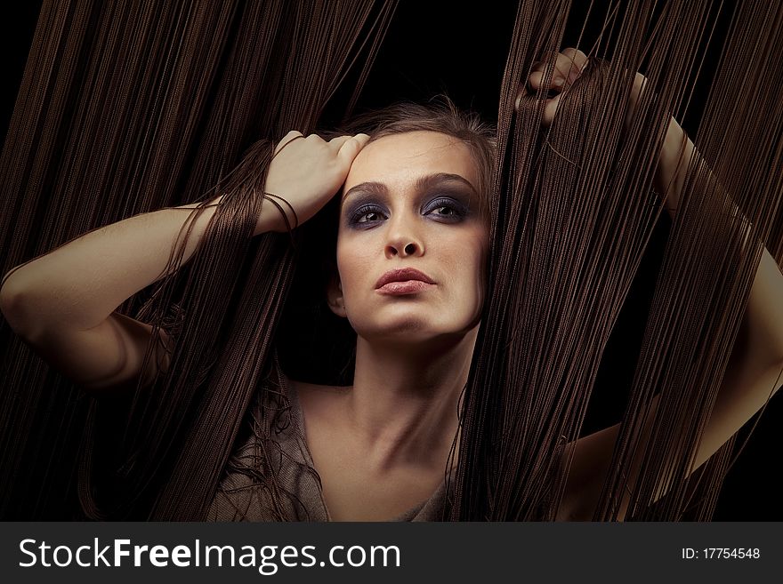 Portrait of pretty young woman with threads. Portrait of pretty young woman with threads