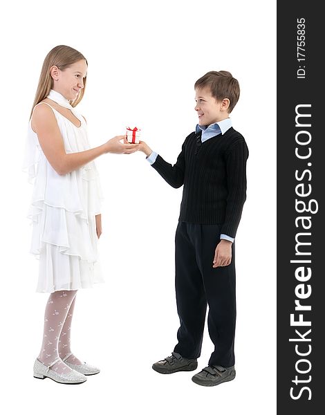 The boy gives to the girl a gift