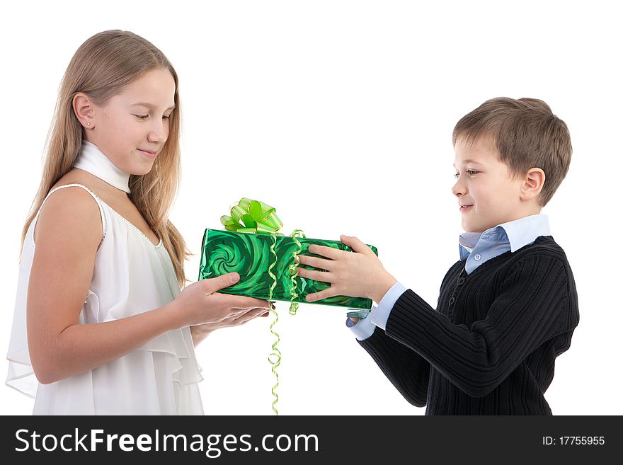 The boy gives to the girl a gift on a white background