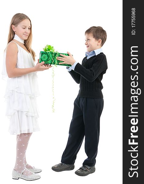 The boy gives to the girl a gift on a white background