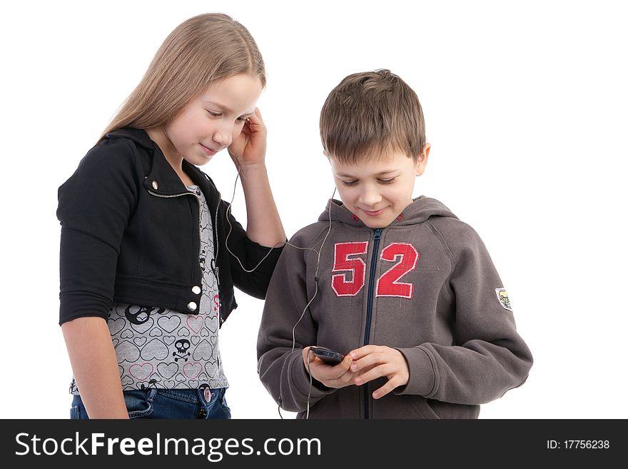 Children listen to music on a white background