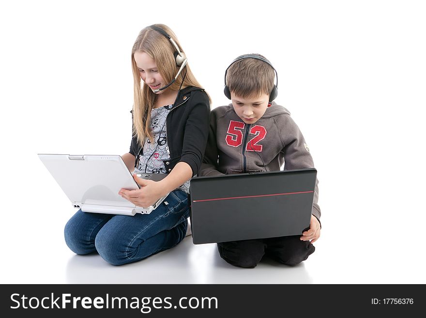 Children with laptops on a white background