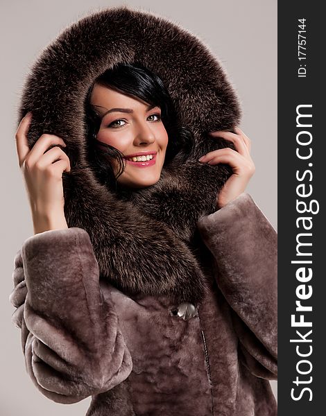 Young Woman In A Fur Coat