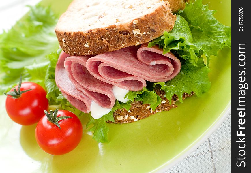 Rustic Sandwich with lettuce, ham and wholegrain bread