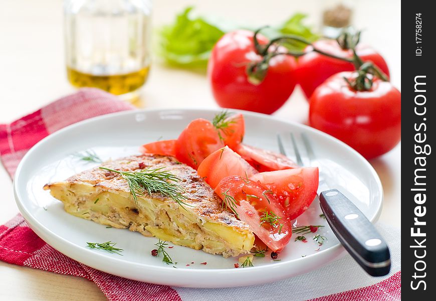 Delicious omelet with vegetable and tomato salad for breakfast