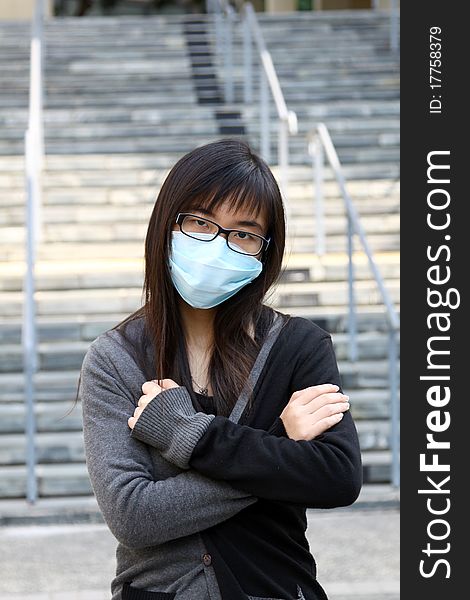 Asian Girl Who Is Sick And Wearing Mask