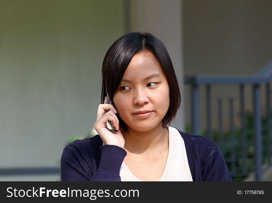 Chinese Girl Who Is Talking In Phone