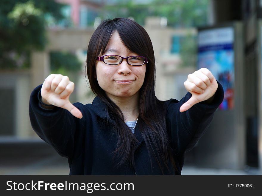 She shows her disagreement with happy face. She shows her disagreement with happy face.