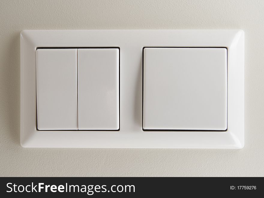 Two light switches on wall