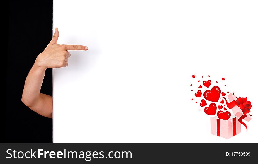 Woman hand pointing to white wall