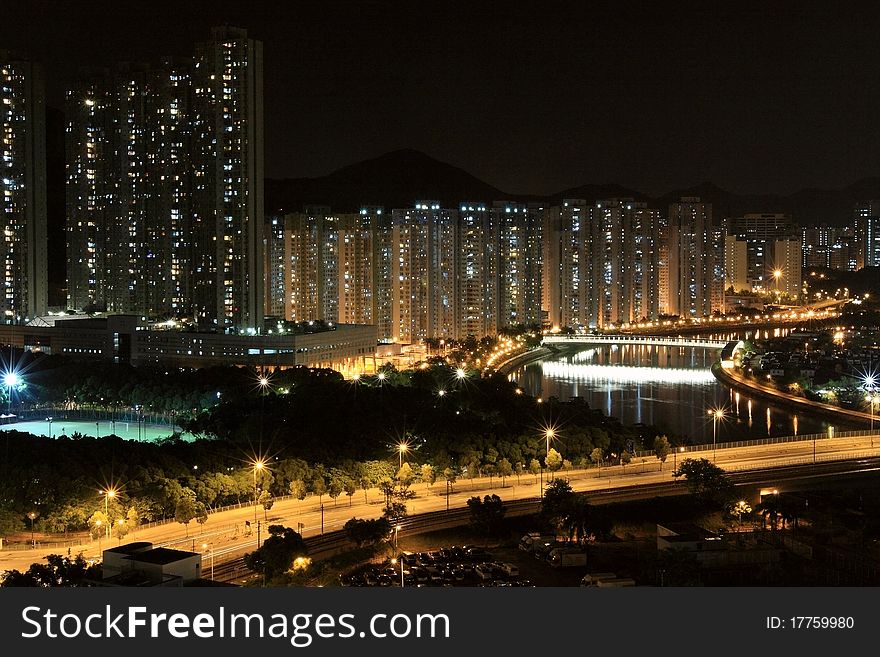 It is a night view in Tuen Mun downtown of Hong Kong. It can see Tuen Mun River. It is a night view in Tuen Mun downtown of Hong Kong. It can see Tuen Mun River.