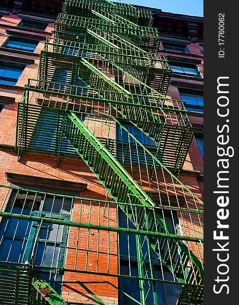 Tenement building and fire escapes in New York. Tenement building and fire escapes in New York