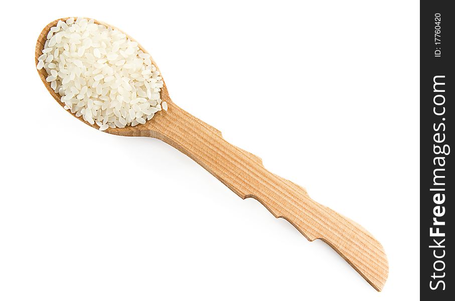 Rice Grain In Wooden Spoon Isolated On White