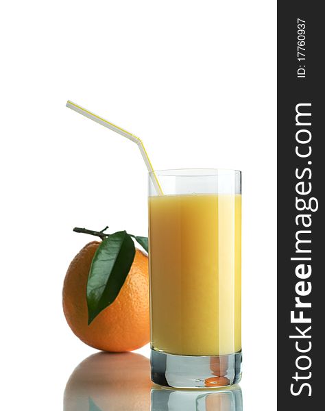 Orange and orange juice in a glass on a white background